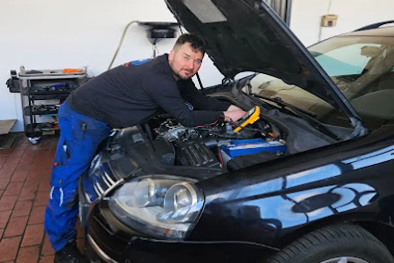 Mechanic working on car